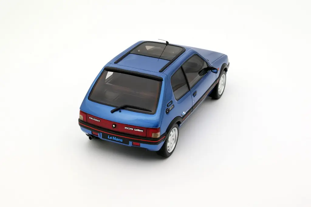 ot1153-peugeot-205-1-9-gti-le-mans-miami-blue-1991-07.webp