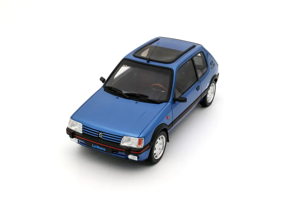 ot1153-peugeot-205-1-9-gti-le-mans-miami-blue-1991-06.webp