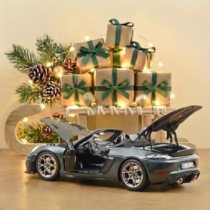 porsche-718-spyder-rs-pack-weissach-2023-forestgreenmetallic-1-18 (1).webp