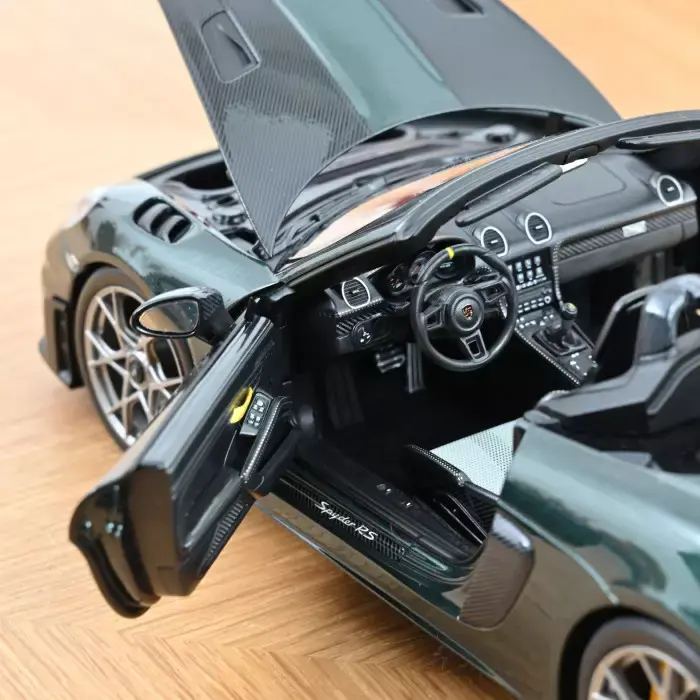 porsche-718-spyder-rs-pack-weissach-2023-forestgreenmetallic-1-18 (3).webp