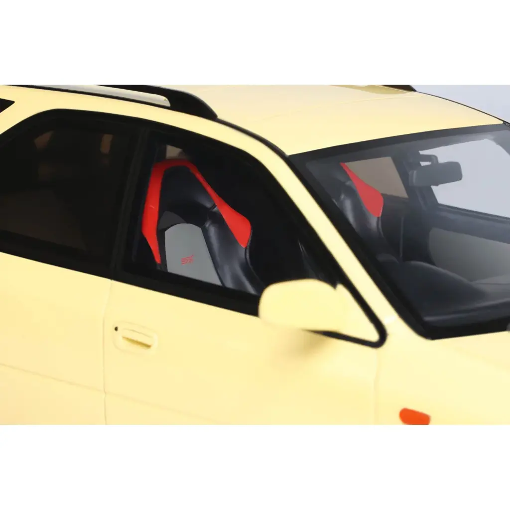 subaru-impreza-wrx-sti-version-vi-sport-wagon-cashmere-yellow-1999 (9).webp